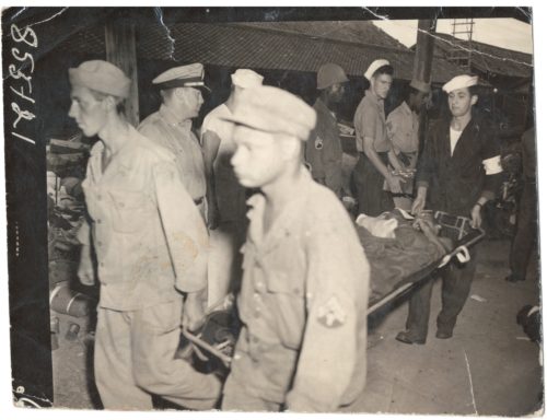 Dr. Thomas A. Harris reviewing incoming POWs in Nagasaki.